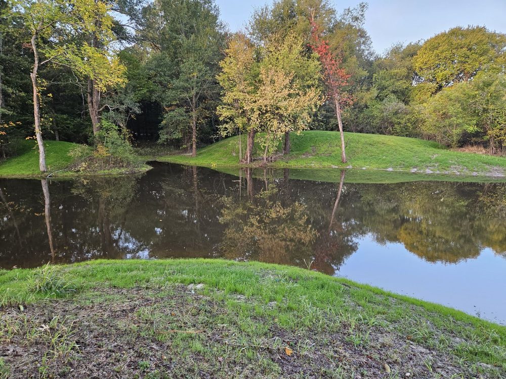 Finished pond and site work by Ray Construction & Demolition