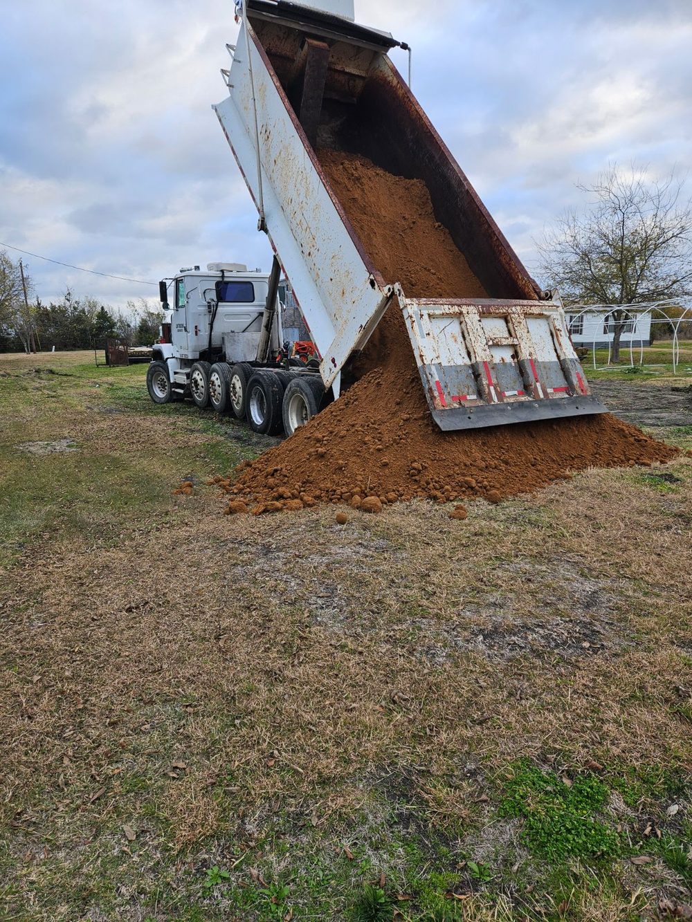 Dump truck hauling and material delivery