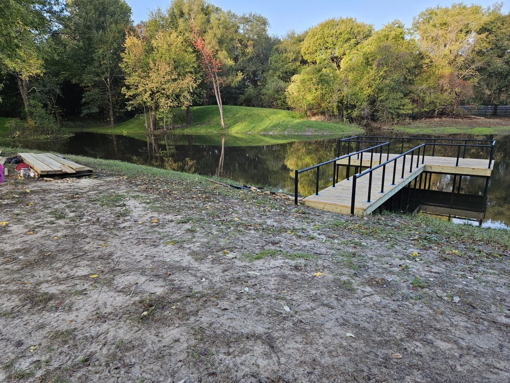 Pond with dock and waterfront work